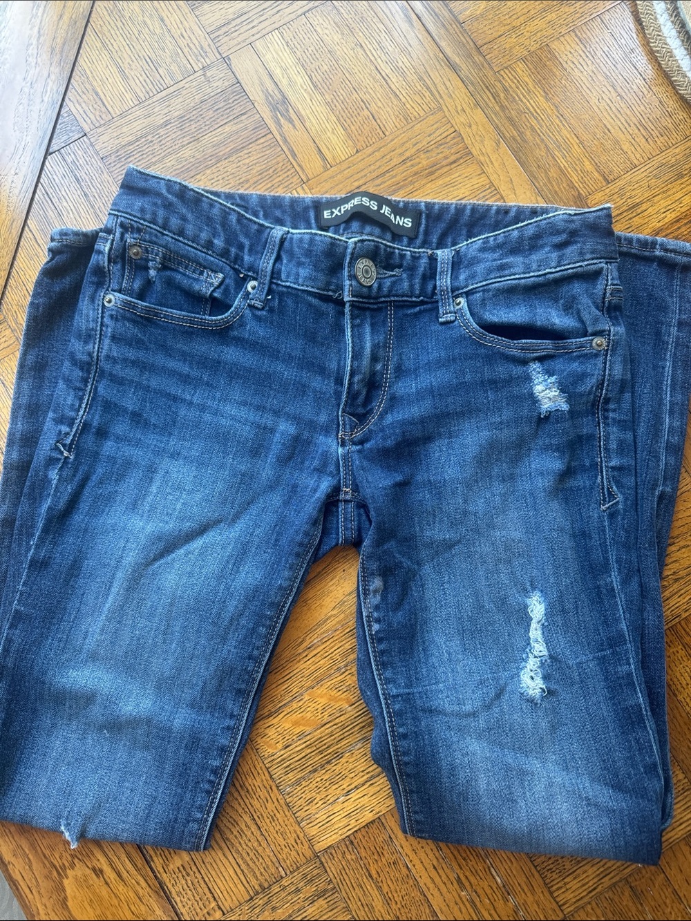 Express Women's Indigo Skinny Jeans with Light Distressing